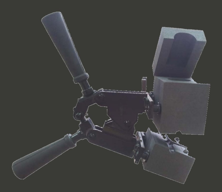 Uni-Weld welding handling clamp holding a graphite mould